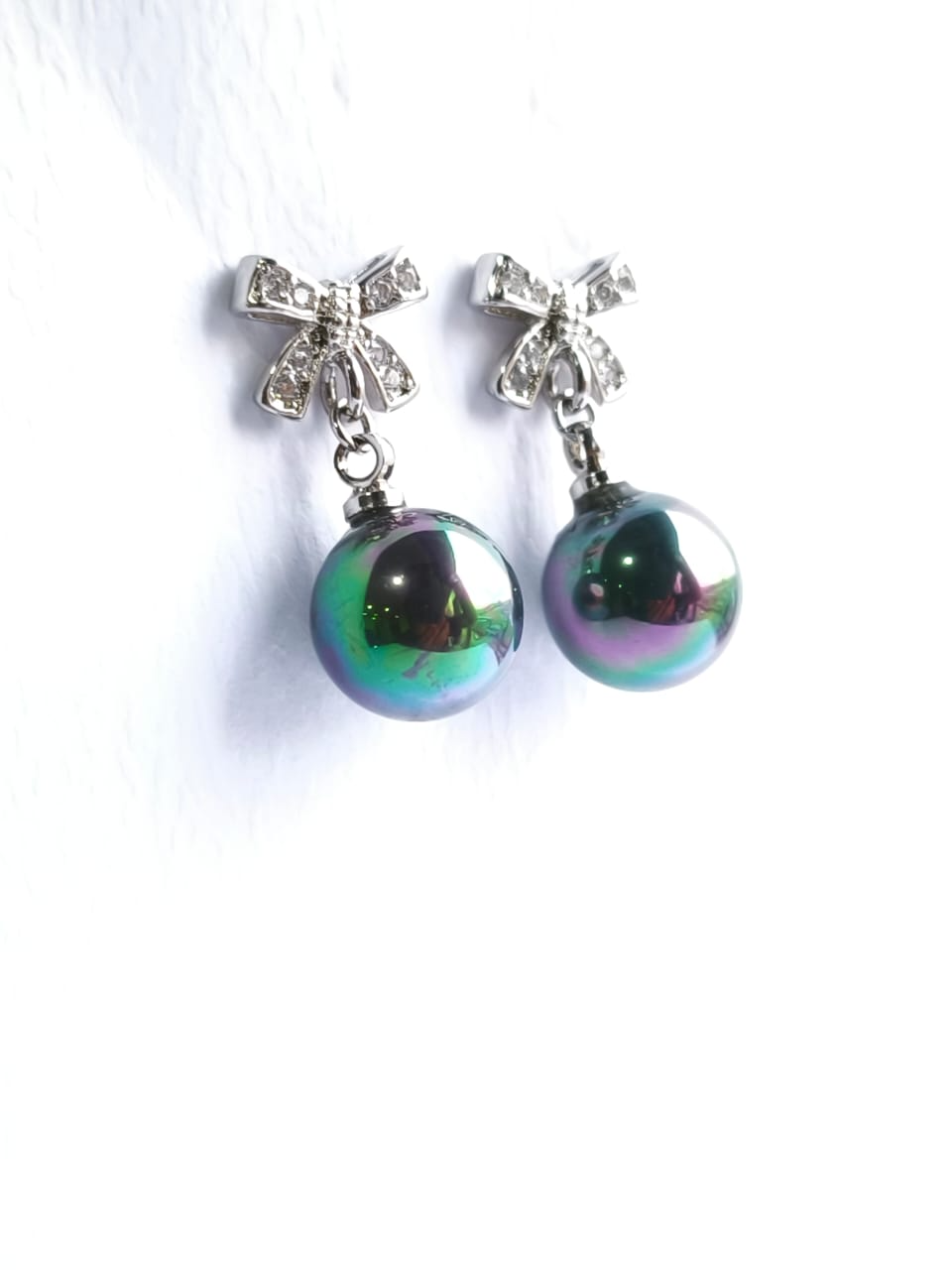 Aretes perla con moño